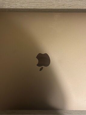 Apple Gold Laptop with Black Apple Logo
